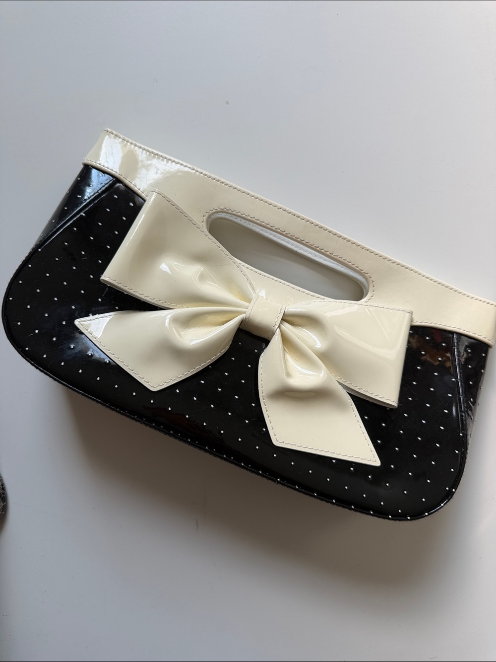 Isabella Fiore Black Patent Clutch with Cream Bow